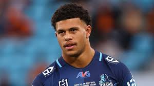 Gold Coast Titans lock keen to stay at the club amid interest from the Melbourne Storm and Sydney Roosters to sign him